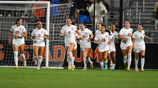 women's soccer group celebration photo