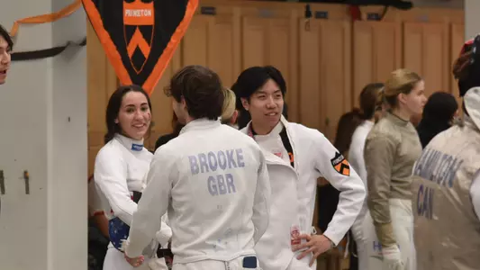 fencers candid photo standing smiling