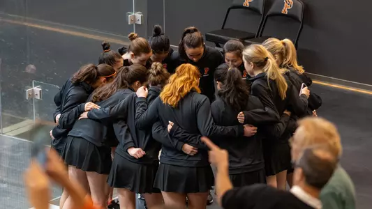 women's squash huddle