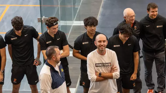 sean wilkinson and men's squash players during introductions