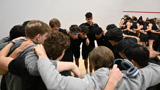 men's squash huddle photo