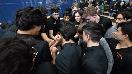 men's squash huddle photo