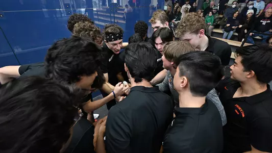 men's squash huddle photo