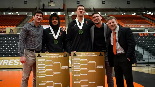 McGowan and Stout 2025 Ivy Champs with Coaches