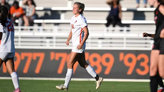 nina cantor smiling candid on field