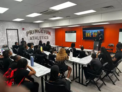Students of Tigers Together Journey to Athletics meeting in Zanfrini Conference Room