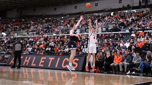 CJ Happy shoots in crowded Jadwin Gym