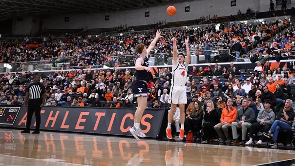 CJ Happy shoots in crowded Jadwin Gym