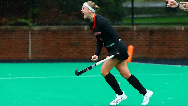Pru Lindsey celebrates her penalty stroke goal that tied the game against Northwestern with 1:13 to play.