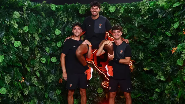 Landon Ardila carried by Evan Wen and Aleksandar Mitric