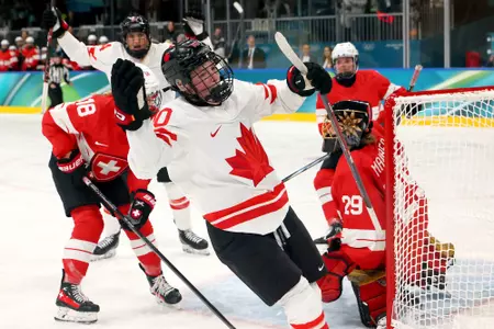 MILAN, ITALY - FEBRUARY 07: Sarah Fillier #10 of Team Canada celebrates a power-play goal in the third period during the Women's Preliminary Round Group A match between Canada and Switzerland on day one of the Milano Cortina 2026 Winter Olympic games at Milano Rho Ice Hockey Arena on February 07, 2026 in Milan, Italy. (Photo by Bruce Bennett/Getty Images)