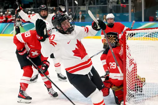 MILAN, ITALY - FEBRUARY 07: Sarah Fillier #10 of Team Canada celebrates a power-play goal in the third period during the Women's Preliminary Round Group A match between Canada and Switzerland on day one of the Milano Cortina 2026 Winter Olympic games at Milano Rho Ice Hockey Arena on February 07, 2026 in Milan, Italy. (Photo by Bruce Bennett/Getty Images)