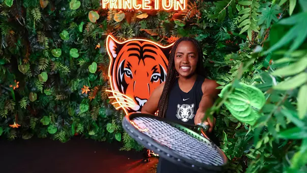 Tsehay Driscoll in front of the Tiger background