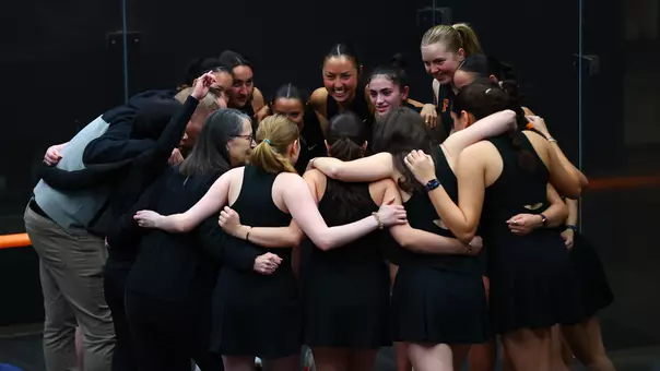 women's squash huddle photo