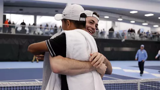 Men's tennis celebration vs. UNC