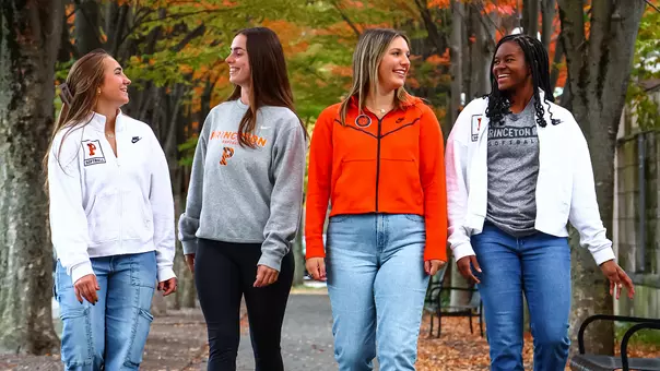 candid photo of softball seniors walking