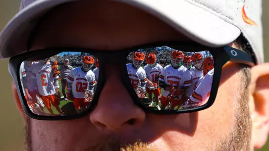 Players reflecting off Coach Jim Mitchell's shades