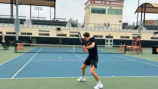 Men's tennis practice at Texas