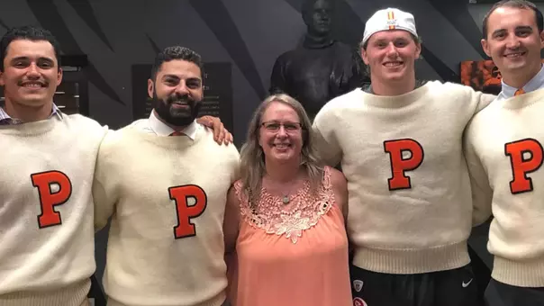 Stacie Traub and football alums
