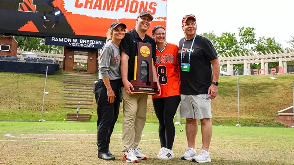 Drew Cottrell and family with NCAA championship trophy