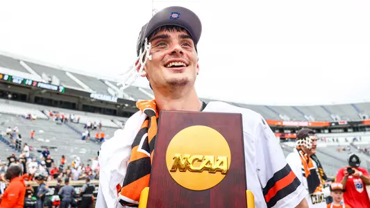Nate Kabiri with NCAA championship trophy