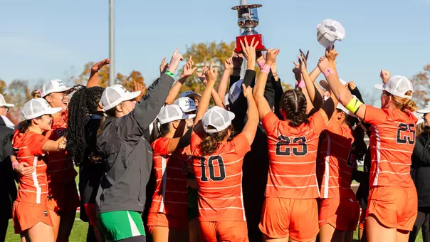 women's soccer Ivy trophy celebration photo