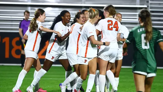 women's soccer celebration vs loyola