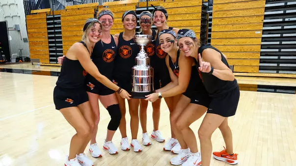 team building competition celebration with trophy