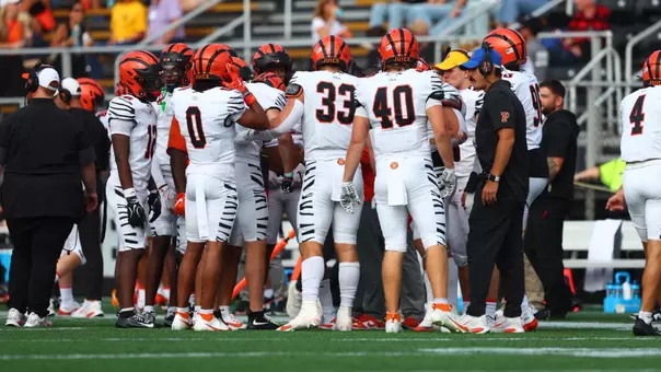 Football sideline vs. Bryant