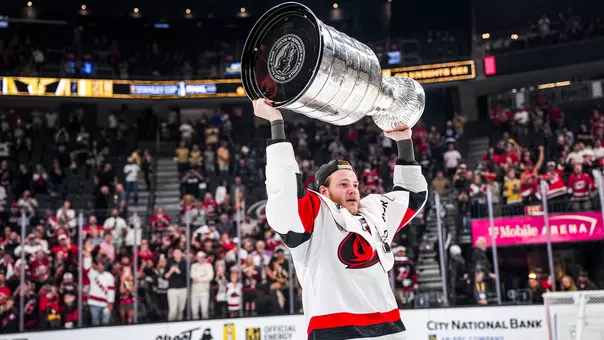Eric Robinson Lifts The Stanley Cup