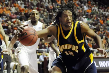 Men's Basketball Defeats Yale, 84-75, In Season Opener Image