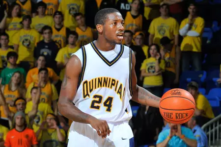 Men's Basketball Outlasts Rhode Island, 73-66 Image