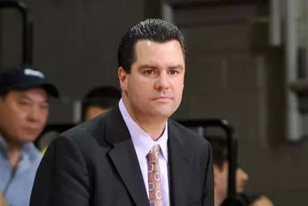 Men's Basketball Head Coach Tom Moore Signs Contract Extension Through 2014-15 Image
