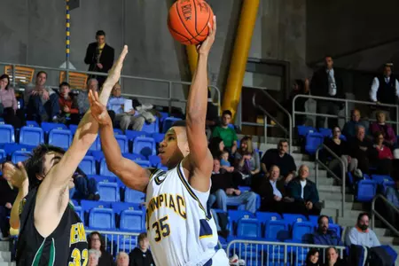 Men's Basketball Erases 14-Point Second-Half Deficit To Defeat Monmouth, 72-70 Image