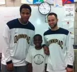 Members of Men's Basketball Assist Students At Shepherd Glen Image