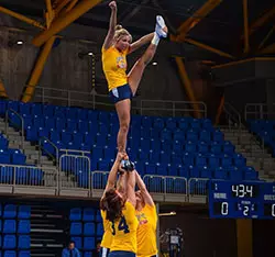 QU Acrobatics & Tumbling Opens Season With Second Place Finish In Tri-Meet Against Baylor And Concordia Image