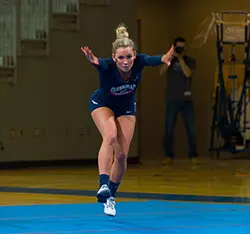 QU Acrobatics & Tumbling Finishes in Second Place at Tri-Meet with Hawai'i Pacific and Alderson Broaddus Image