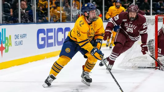 Alex Whelan Looks for Pass vs. Colgate
