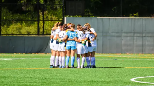 Team huddles before half begins