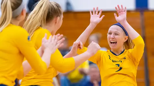 Morgan Sherwin High Fives Teammates