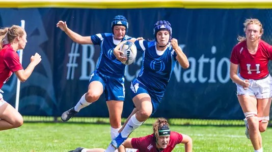 Remy Spires Running with Ball Against Harvard