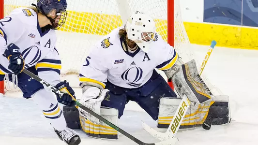 Abbie Ives saves puck