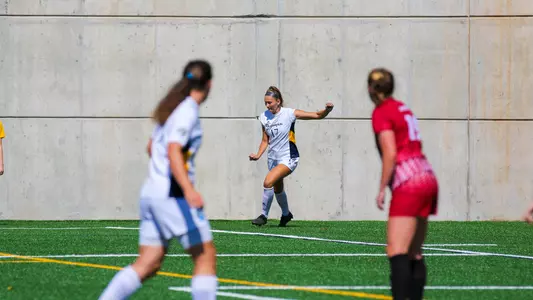 Lauren Wendland takes a corner