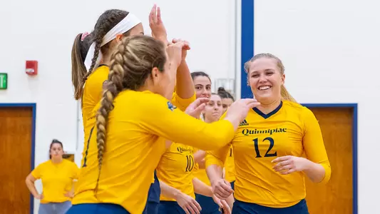 Kaleigh Oates High Fives Teammates Pregame vs. Manhattan