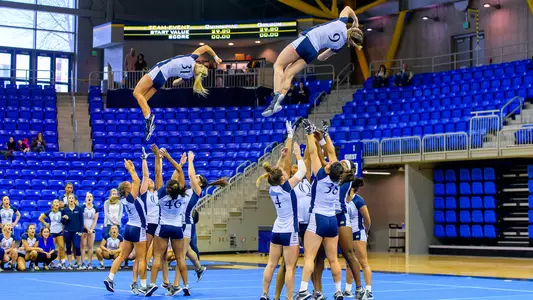 Cassidy Osher and Melanie Mancini Toss vs. Oregon
