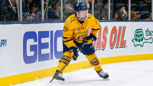 Odeen Tufto Passing Puck vs. Colgate at Nassau