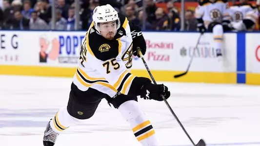 Connor Clifton Shoots Puck