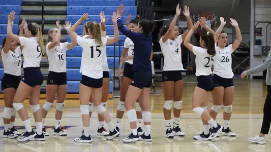 Volleyball Team Celebrates Victory Over Seton Hall