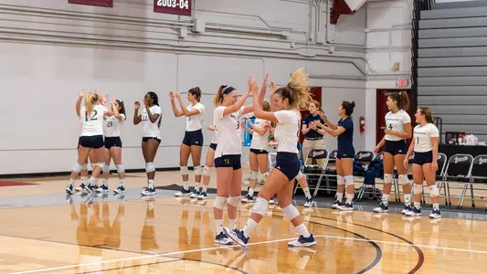 Quinnipiac Volleyball Players High Five During Pregame Introductions