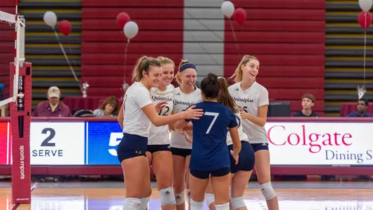 Volleyball Team Celebrates Winning a Point Against Rutgers